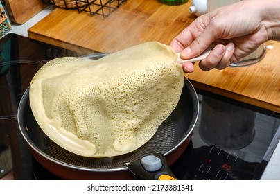 Process Of Making Off Handmade Home Stile Delicious Golden Pan Cakes Cooked On The Dark Oven And Preparing For Turn It Up. Good Morning Breakfast At The Farm Kitchen. Studio Photography.