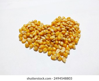The process of making popcorn involves heating juicy corn kernels to a high temperature, so that the water in the kernels evaporates and presses against the walls of the kernels until a small explosio