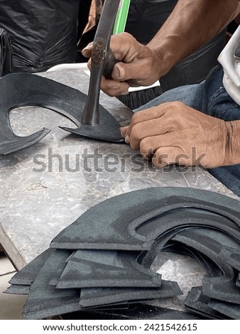 The process of making shoes by hand from genuine cowhide