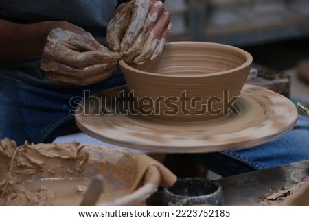 The process of making tableware product from clay. Pembuatan mangkok dan gelas dari tanah liat