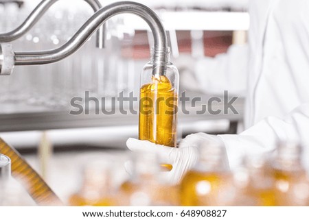 Similar – Bottles with yellow serum and a injection needle, syringe