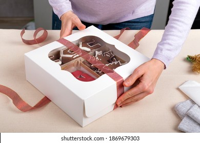 Process Of Packing Confectionery Gift Box. Cookies In Cardboard Box.