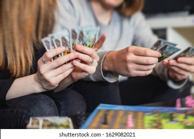 Process of playing board game and having fun with friends and family, board game concept, hand playing and roll the dice