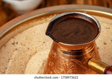 Process of preparation of coffee in turk in cezve on sand