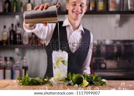 The process of preparing refreshing mojito