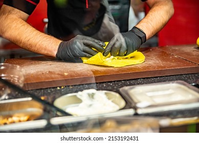 Process Of Preparing Traditional Turkish Fast Food - Shawarma Or Kebab. Chef Hand Cooking Food