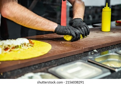 Process Of Preparing Traditional Turkish Fast Food - Shawarma Or Kebab. Chef Hand Cooking Food