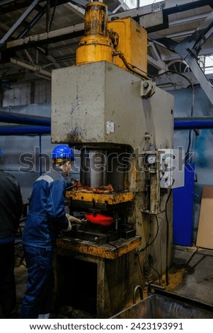 Process of pressing and quenching of hot iron part.