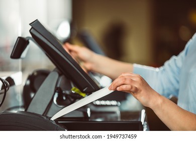 Process of printing invoice for a customer, credit card processor, receipt printer with paper shopping bill and touchscreen monitor, POS - Shutterstock ID 1949737459