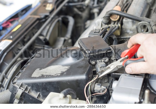 The process of
repair wiring car using
pliers