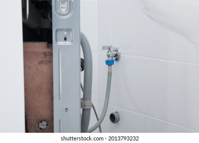 the process of repairing the washing machine, disconnecting the water supply and sewerage