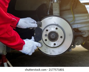 Process of replacing brake pads with Brand new. Auto mechanic repairing in garage Car brakes. Car Maintenance checklist