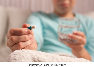 The Process Of Taking Medication By A Teenager