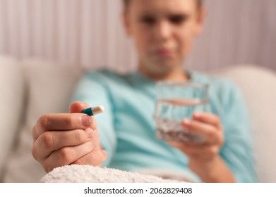 The Process Of Taking Medication By A Teenager