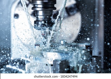 A Process Of Vertical Cnc Steel Milling With External Water Coolant Streams And Splashes