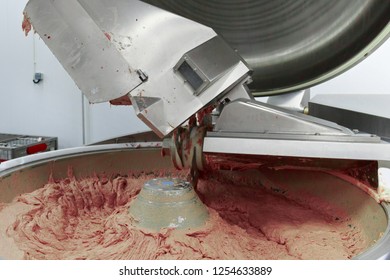 Process of work big steel grinder in production of sausage in the meat plant. - Powered by Shutterstock