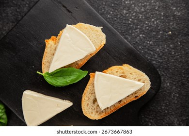 Processed cheese spread portion size cheese for sandwich tasty snack fresh delicious gourmet food background on the table rustic food top view copy space