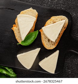 Processed cheese spread portion size cheese for sandwich tasty snack fresh delicious gourmet food background on the table rustic food top view copy space