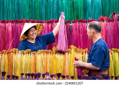Processing of flax trees into different colors to be weaved into mats. One of the occupations and lifestyles of village people in rural Thailand.