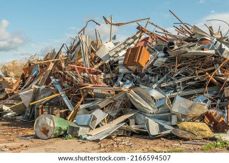 Processing industry, a pile of old scrap metal, ready for recycling. Scrap metal recycling.