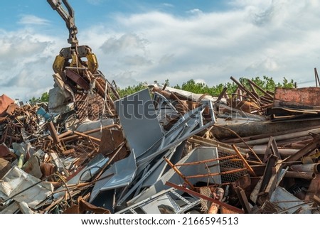 Old Iron Dump In Back Yard Of Factory. Eco Concept Garbage Disaster From Ecological Pollution Of Environment. Waste Pollution Problem