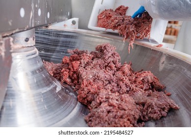 Processing Lard Or Meat In Minced Meat On A Huge Meat Grinder At A Meat Factory Closeup