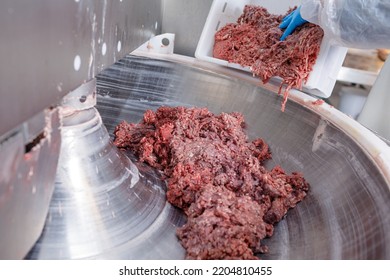 Processing Lard Or Meat In Minced Meat On A Huge Meat Grinder At A Meat Factory Closeup