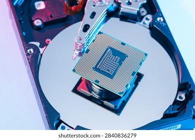 processing unit CPU microprocessor chip placed on opened computer hard disk drive HDD components as a conceptual metaphor for AI hardware semiconductor technology data storage infrastructure and cyber