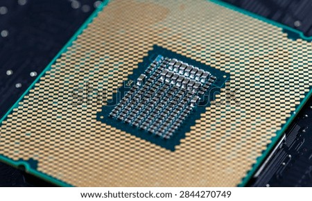 Processor on pcb surface. Circuit board in macro electronics with processor chip. Circuit board for digital computing with processor. Circuitboard as technology background with processor chip.