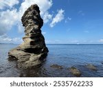 Procida - August 21st 2024: Stone stacks on Sunset Beach, Procida Island, Italy