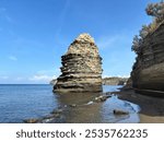 Procida - August 21st 2024: Stone stacks on Sunset Beach, Procida Island, Italy