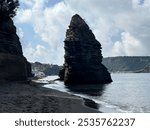 Procida - August 21st 2024: Stone stacks on Sunset Beach, Procida Island, Italy