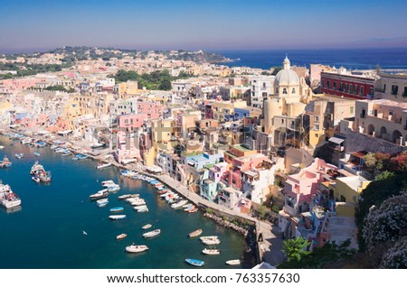 Procida island colorful town with harbour aerial view, Italy