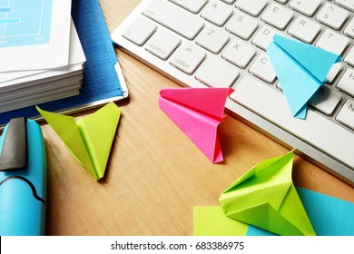 Procrastination Concept. Colorful Paper Planes On A Office Table. 