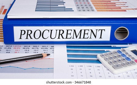 Procurement - blue binder with calculator and business charts in the office