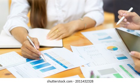 Product development team discuss about the new prototype from analyse feasibility budget at office - Shutterstock ID 2011432328
