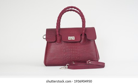 Product: Genuine Cow Leather, Crocodile Skin Texture, Maroon Color, Handmade Embroidery Handle, Simple And Elegant Model With Plain White Background