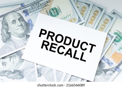 Product Recall Inscription On The Card On The Background Of Dollar Bills, Business Concept