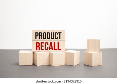 Product Recall Written On A Wooden Blocks On Red. Business Concept. Warranty And Quality Control. High Quality Photo