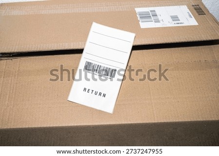 Product return label with barcode close up.
