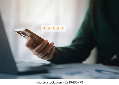Product or service review ideas from customers, writing reviews from customers who use the products and services of the store to express their satisfaction and increase the credibility of the store. - Shutterstock ID 2219486793