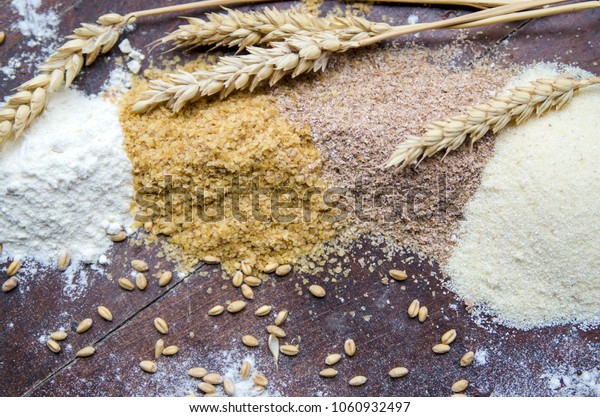 Product type of wheat seed, flour of wheat cereal in\
bakery table:milled wheat sprouts and bran,semolina flour,durum.Top\
view  