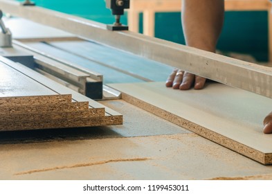 Production of cabinet furniture, cutting parts on a format machine