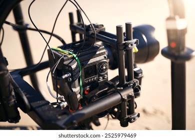 Production, camera and equipment for photoshoot results, video content or quality control. Videography process, closeup and technology for nature, movie or filmmaking with professional gear on beach - Powered by Shutterstock