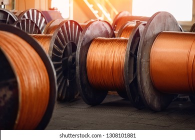 Production of copper wire, bronze cable in reels at factory.