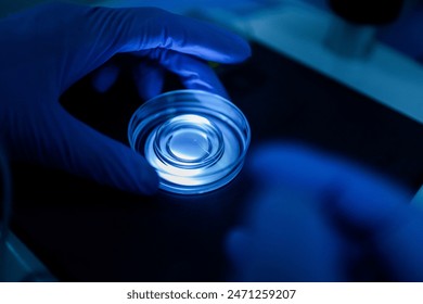 Production line pharmaceutical industry. Manufacturing of drugs and medications, pharmaceuticals. Technician, scientist works in a scientific laboratory	 - Powered by Shutterstock