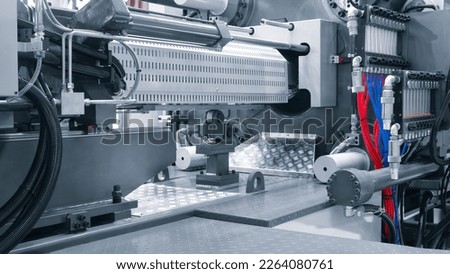 Production machine for manufacture products from pvc plastic extrusion technology, industrial concept background