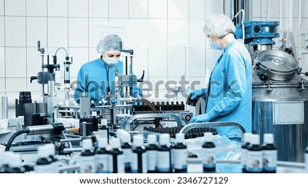 Production of medical dietary supplements. Women work on the packaging line. Factory conveyor and industrial production facility, packing equipment. Production line
