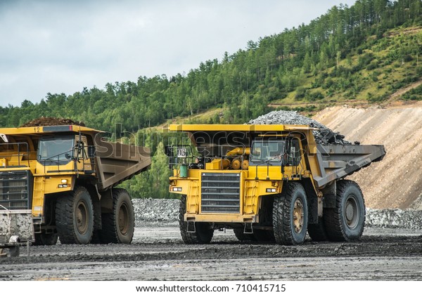Production useful\
minerals. the dump truck\
yellow