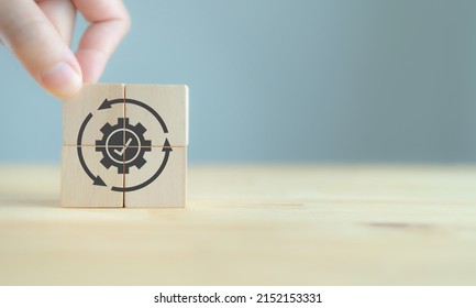 Productivity and production capacity concept.  Industrial management in efficiency and efficient process. Lean cost and  productivity growth. Capacity planning and utilization. Wooden cubes background - Shutterstock ID 2152153331